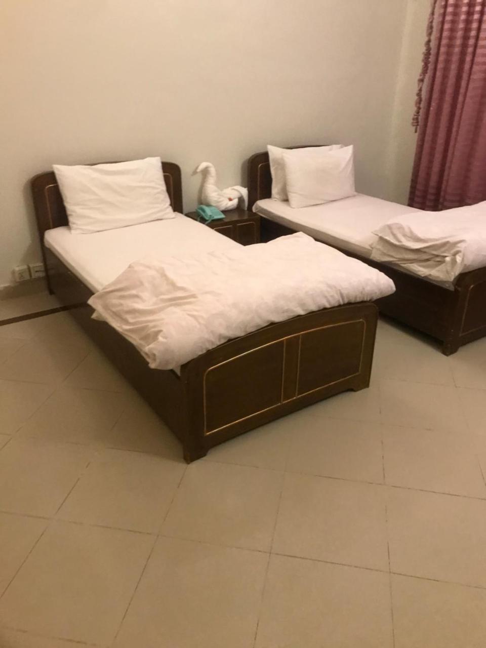 New Shelton Guest House Islamabad Bagian luar foto