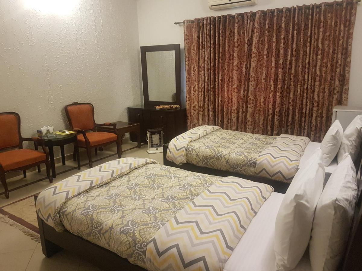 New Shelton Guest House Islamabad Bagian luar foto