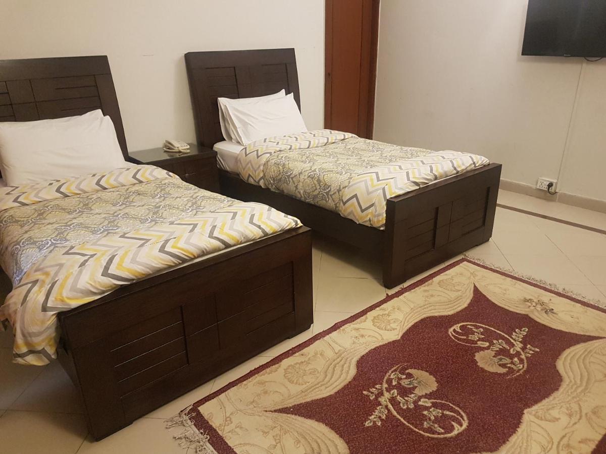 New Shelton Guest House Islamabad Bagian luar foto